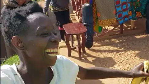 Ugandan Woman Dances With Joy After Being Gifted First Pair Of Shoes