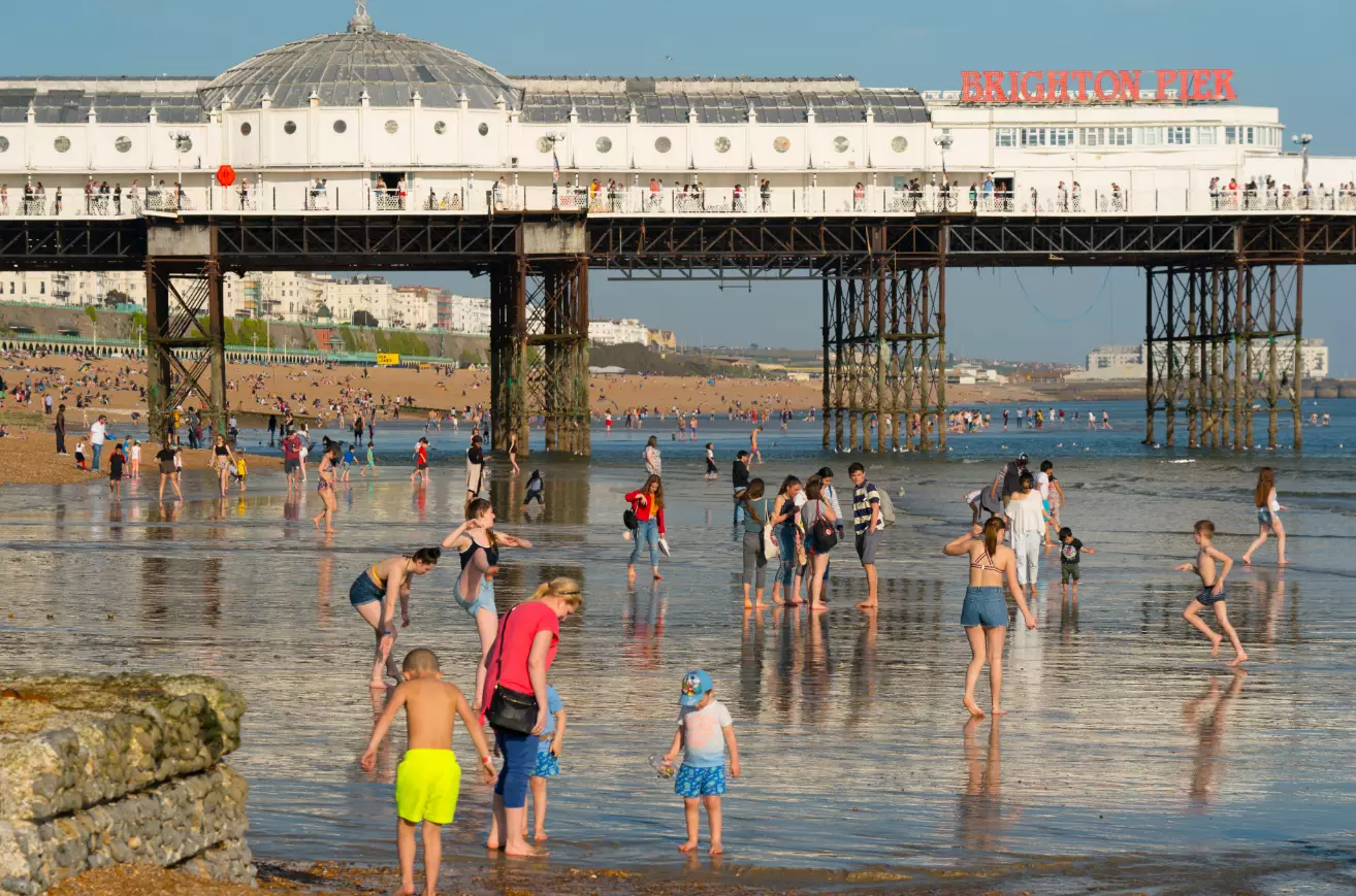 People enjoying the warm weather in Brighton.