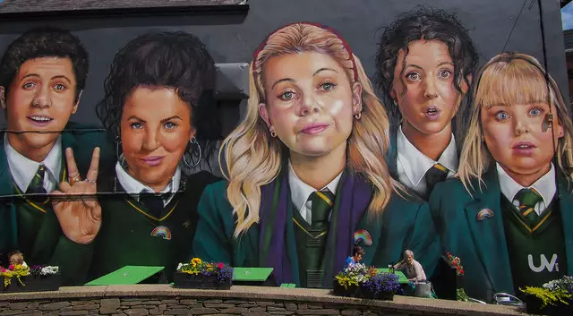 The tour finishes at the famous Derry Girls Mural where guests can take a selfie and be pledged as a Derry Girl, or boy (