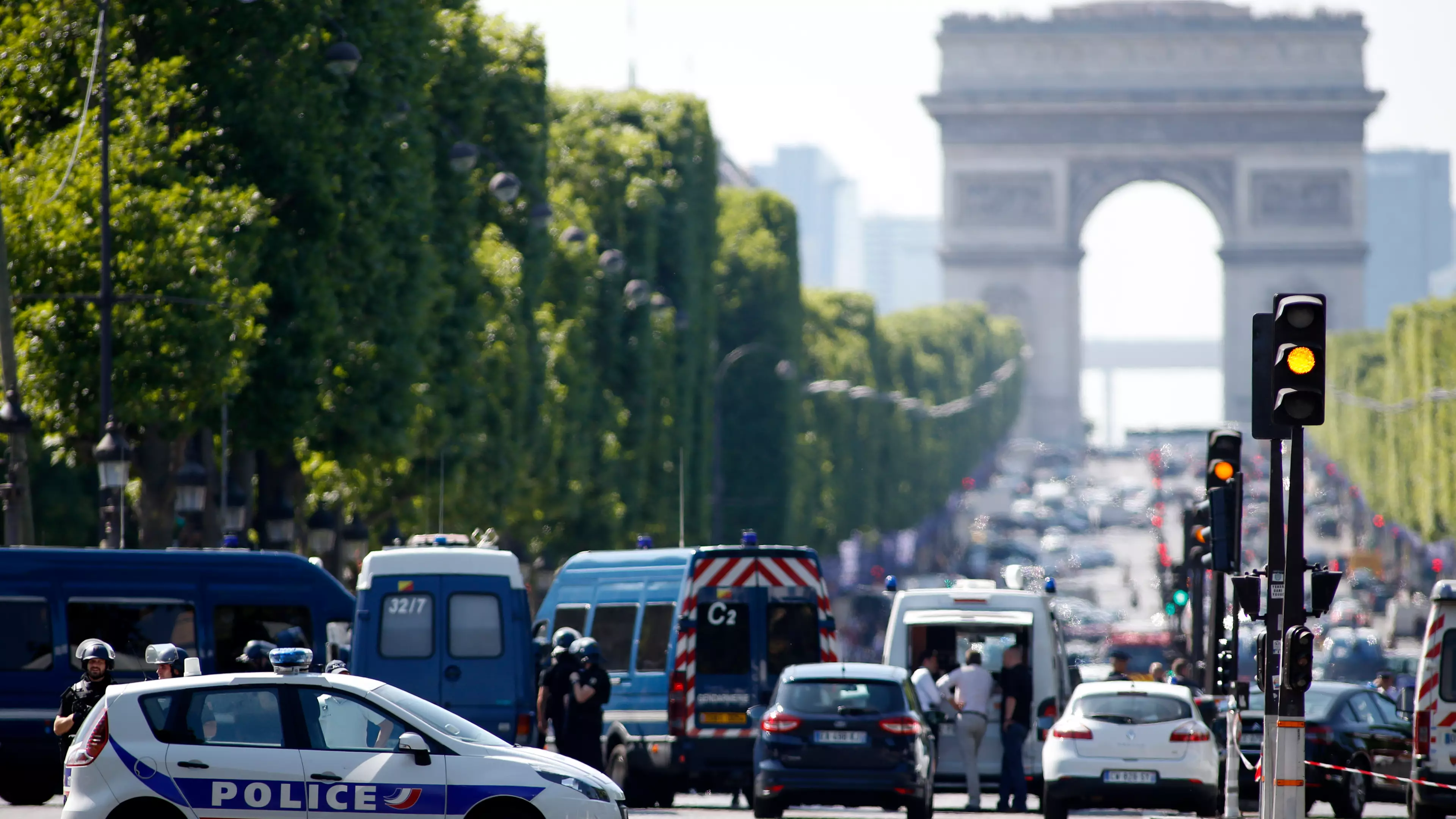 Champs-Élysées Cordoned Off After Car Hits Police Van In Paris 