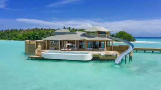You Can Water Slide From Your Bed Into The Ocean At This Maldives Overwater Villa