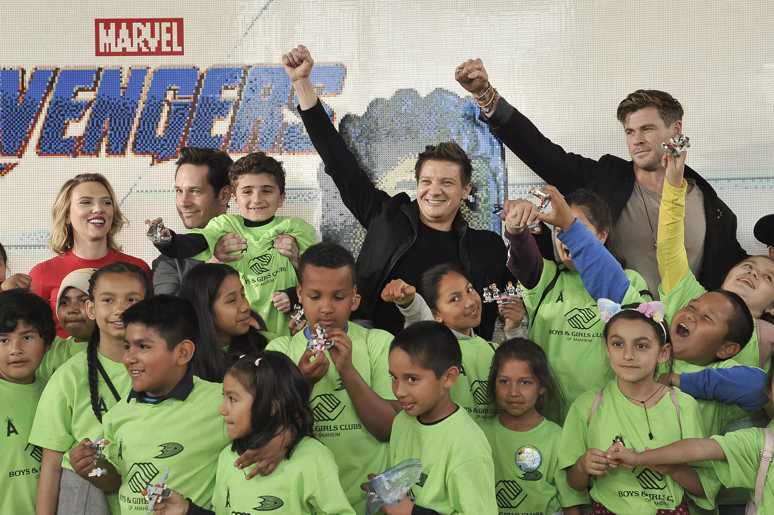 The Avengers stars with some of the local children.
