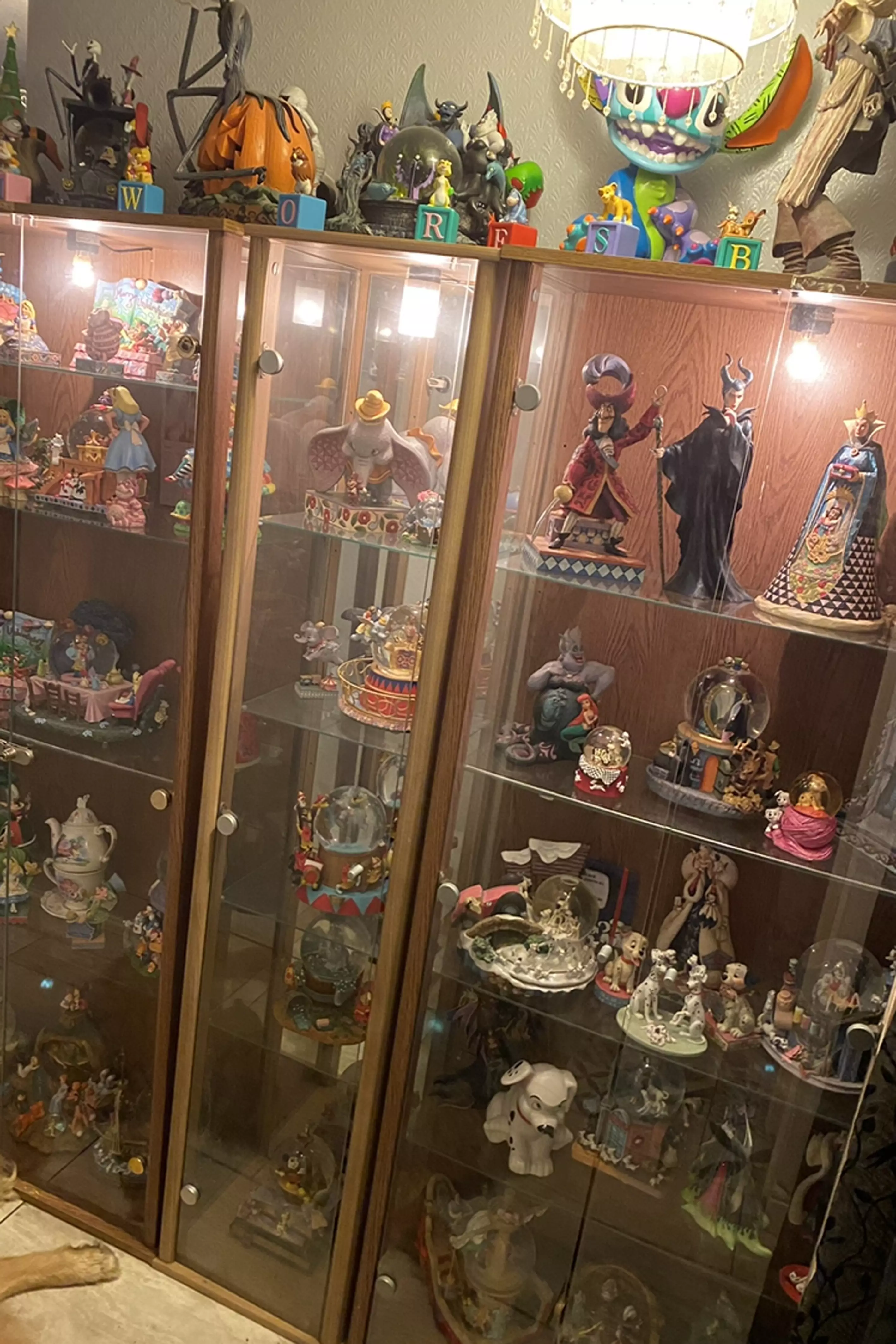 Cabinets are filled top to bottom with figurines (