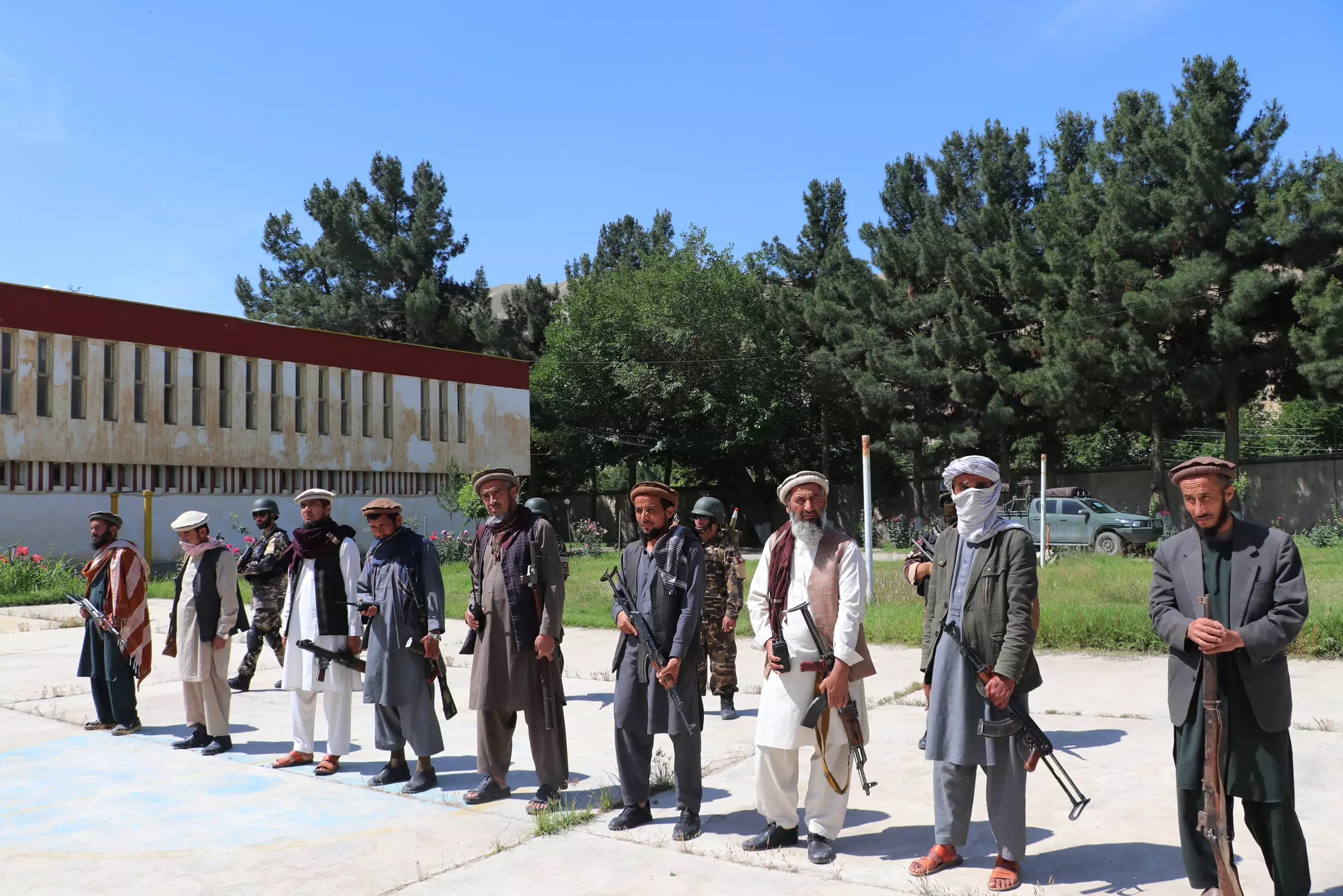 Taliban militants attend a surrender ceremony in Pul-e-Khumri, capital of Baghlan province, Afghanistan.