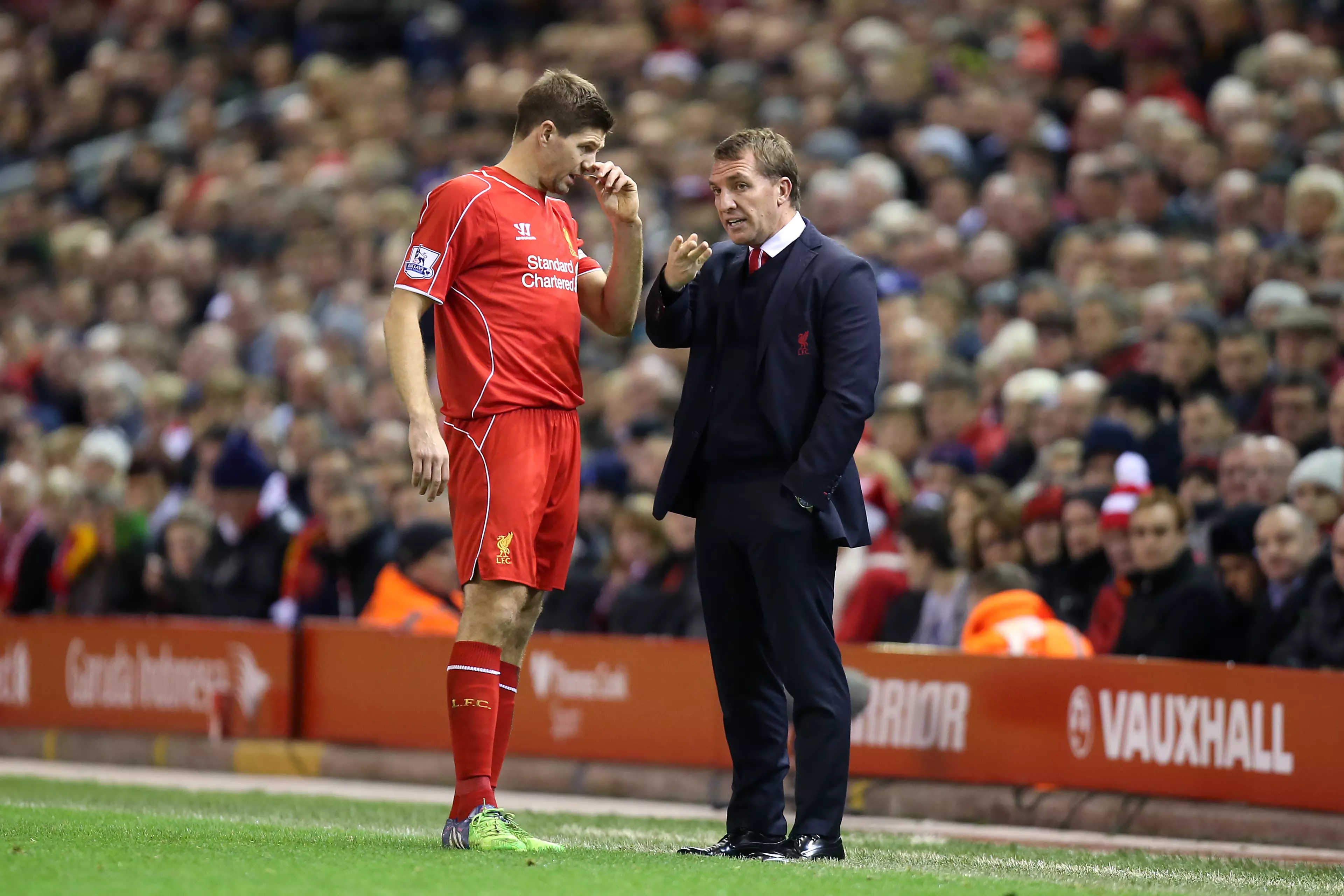 Rodgers gives instructions to Gerrard. Image: PA