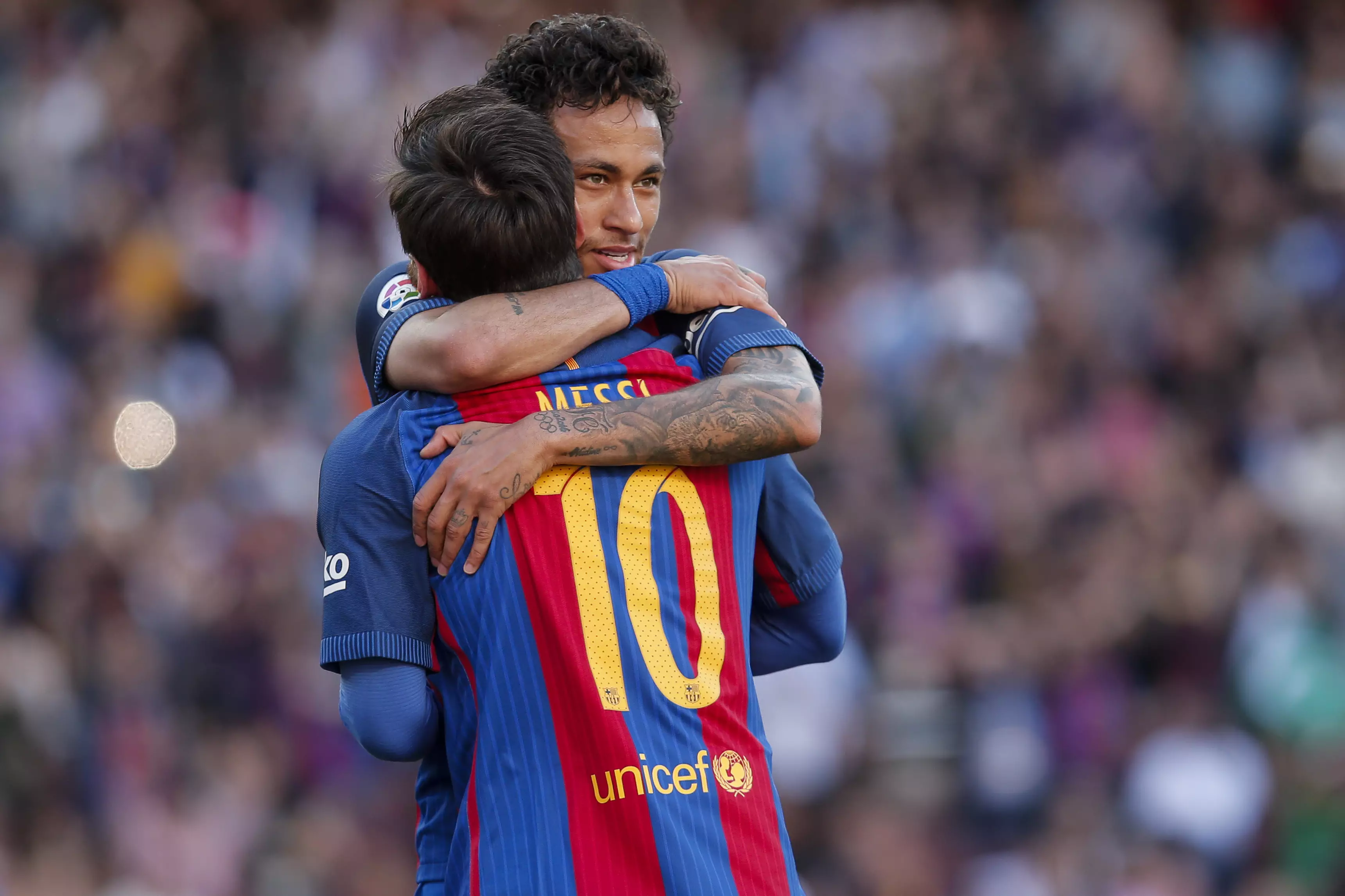 Neymar and Messi celebrate. Image: PA