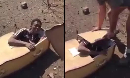White South African Farmer Forces Black Man Into Coffin In Disgusting Footage