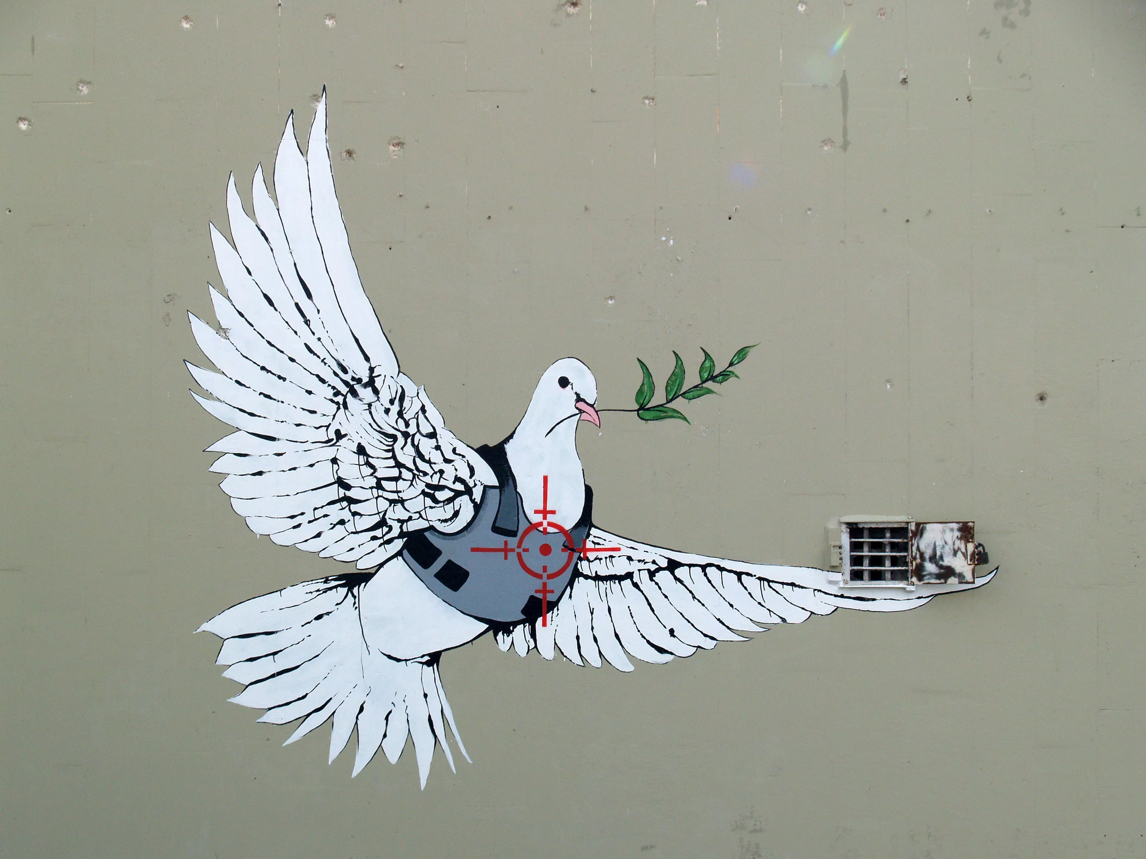 Banksy's 'Dove of Peace' painted on a wall in Bethlehem, West Bank, Palestinian Authority in 2007.