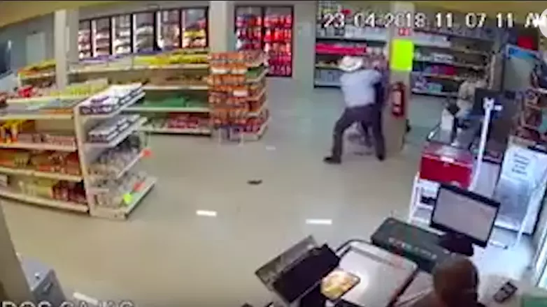 CCTV Footage Captures Cowboy Taking Down Gun-Toting Robber