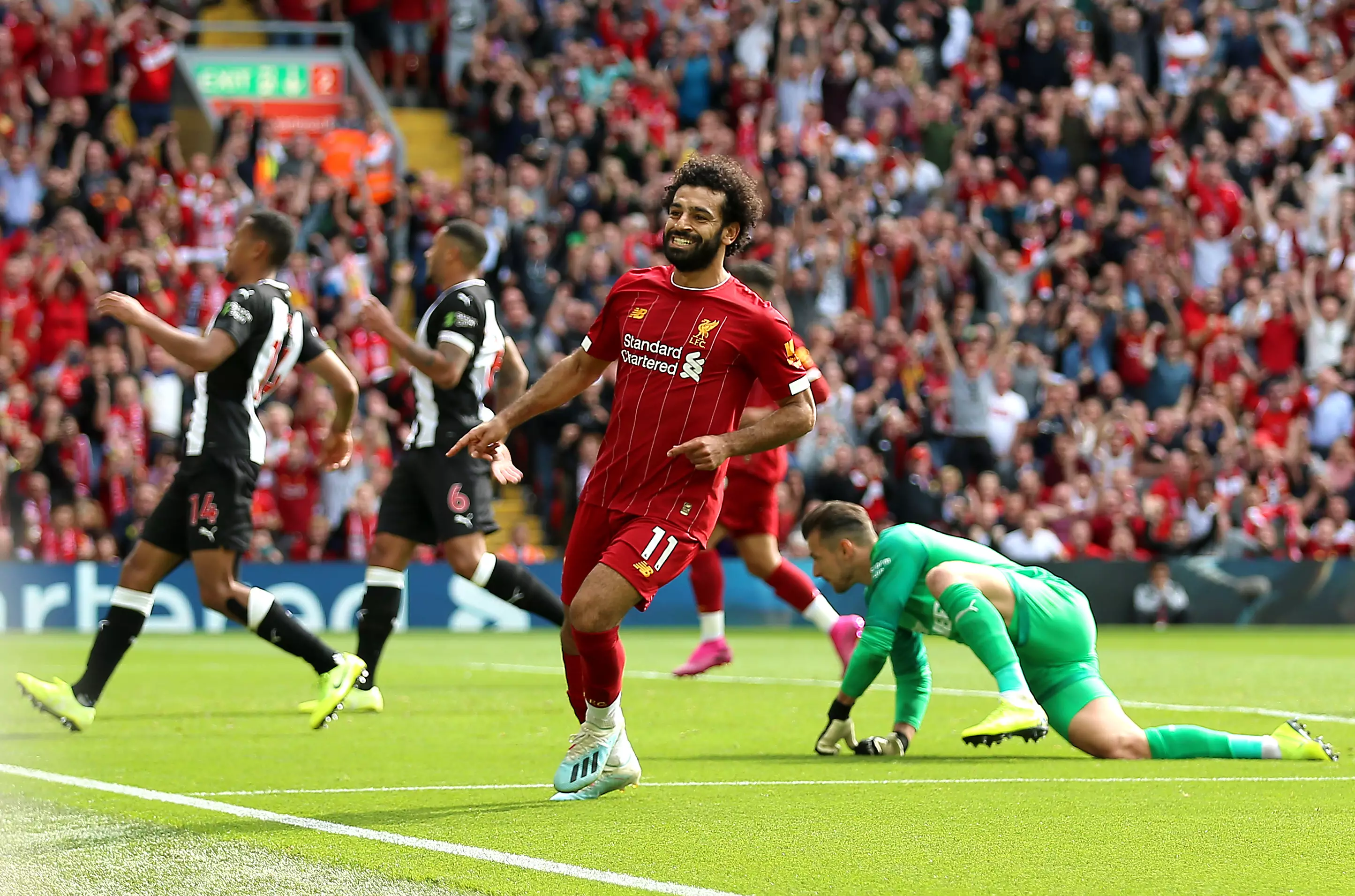 Salah celebrates his sides' third against Newcastle. Image: PA Images