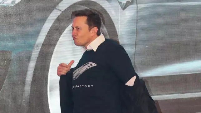 Elon Musk Does Strip Tease Style Dance On Stage In Shanghai For Tesla Launch