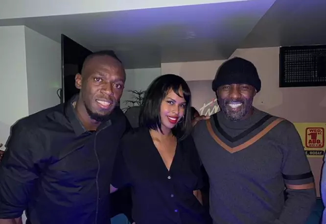 Usain Bolt celebrated the grand opening of his new restaurant with actor Idris Elba.