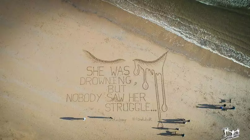 Emotional Message Left In Sand On Beach For Time To Talk Day