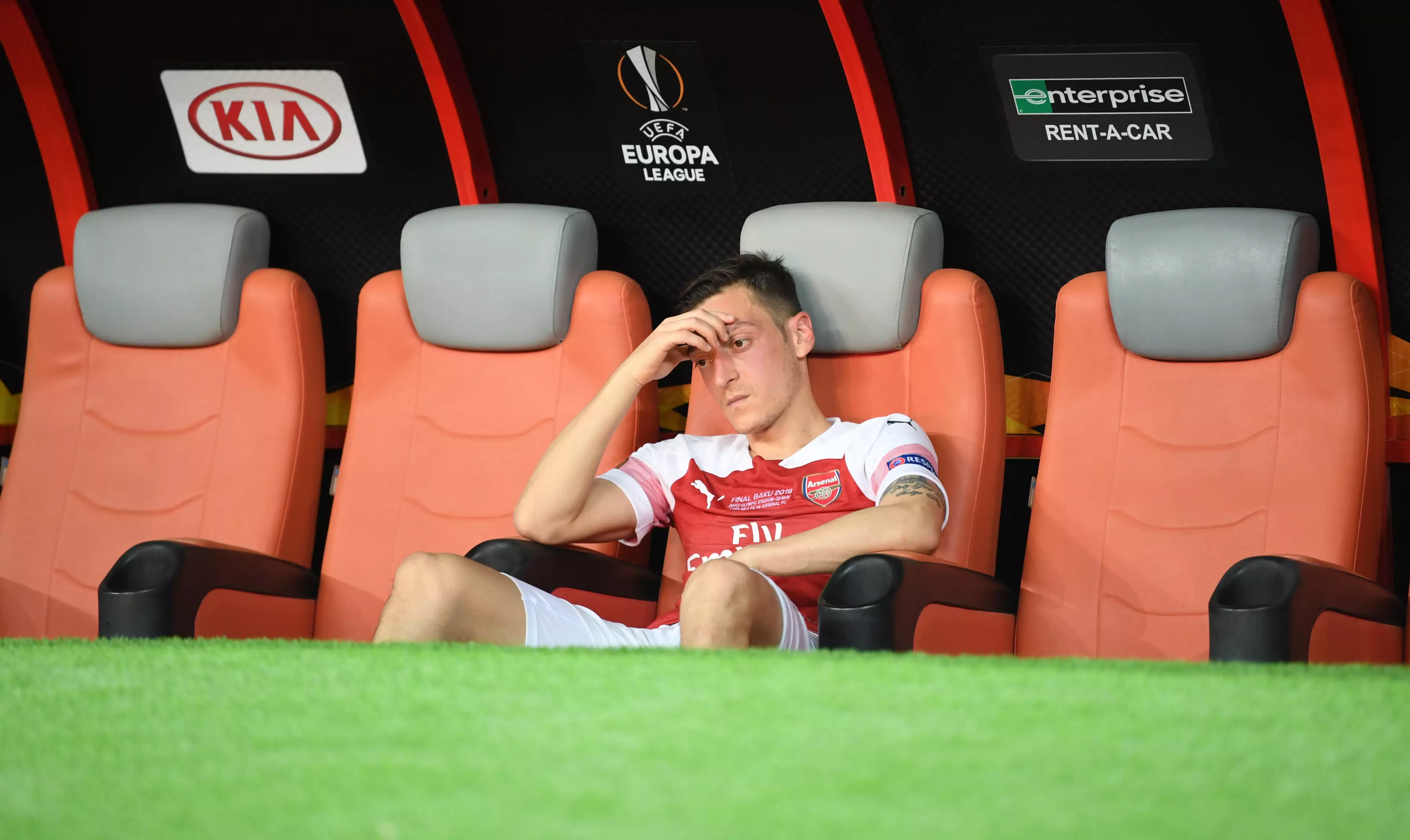 Mesut Ozil realising he's got more chance of being an alien than winning the Premier League. Image: PA Images