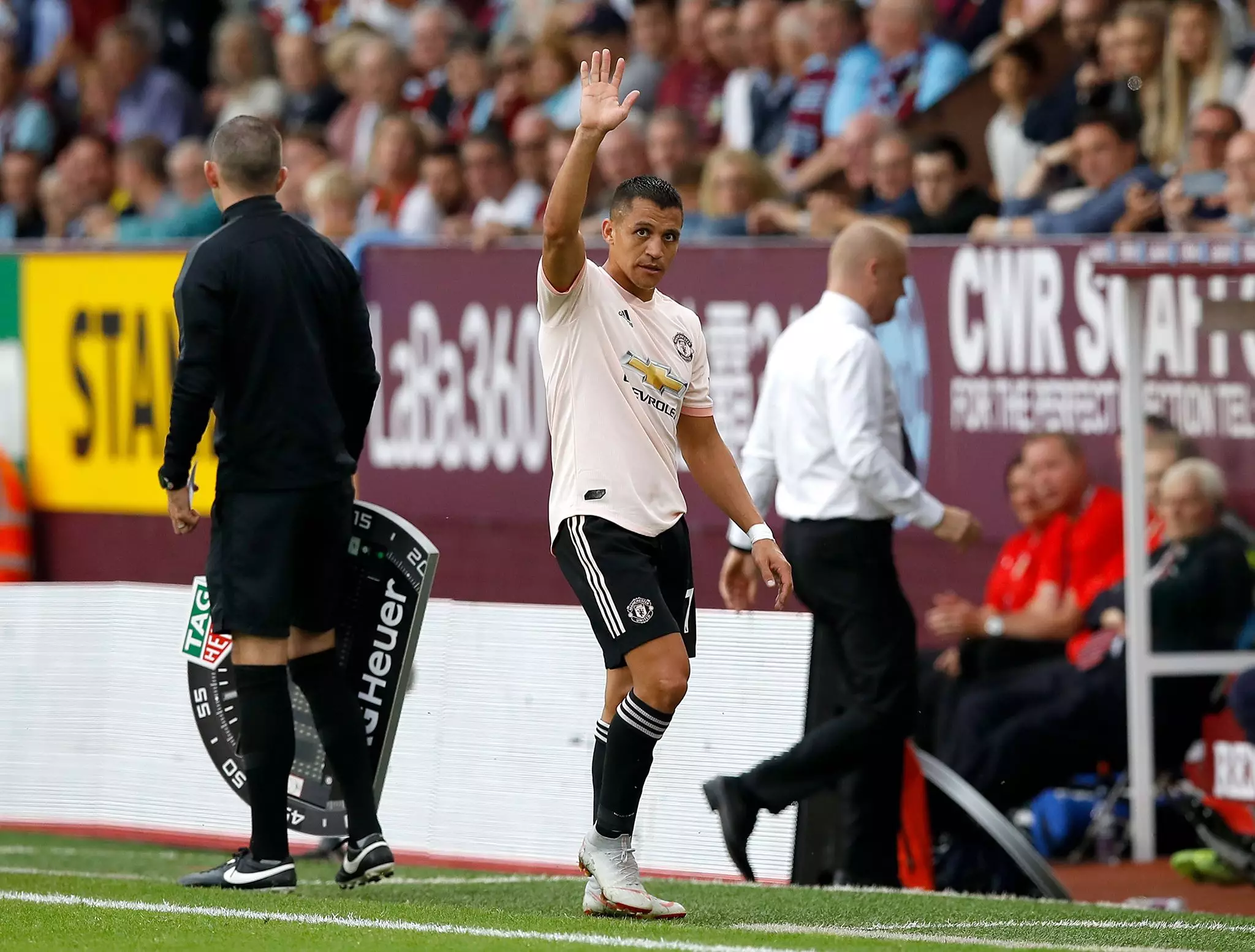 Sanchez gestures to the away fans. Image: PA
