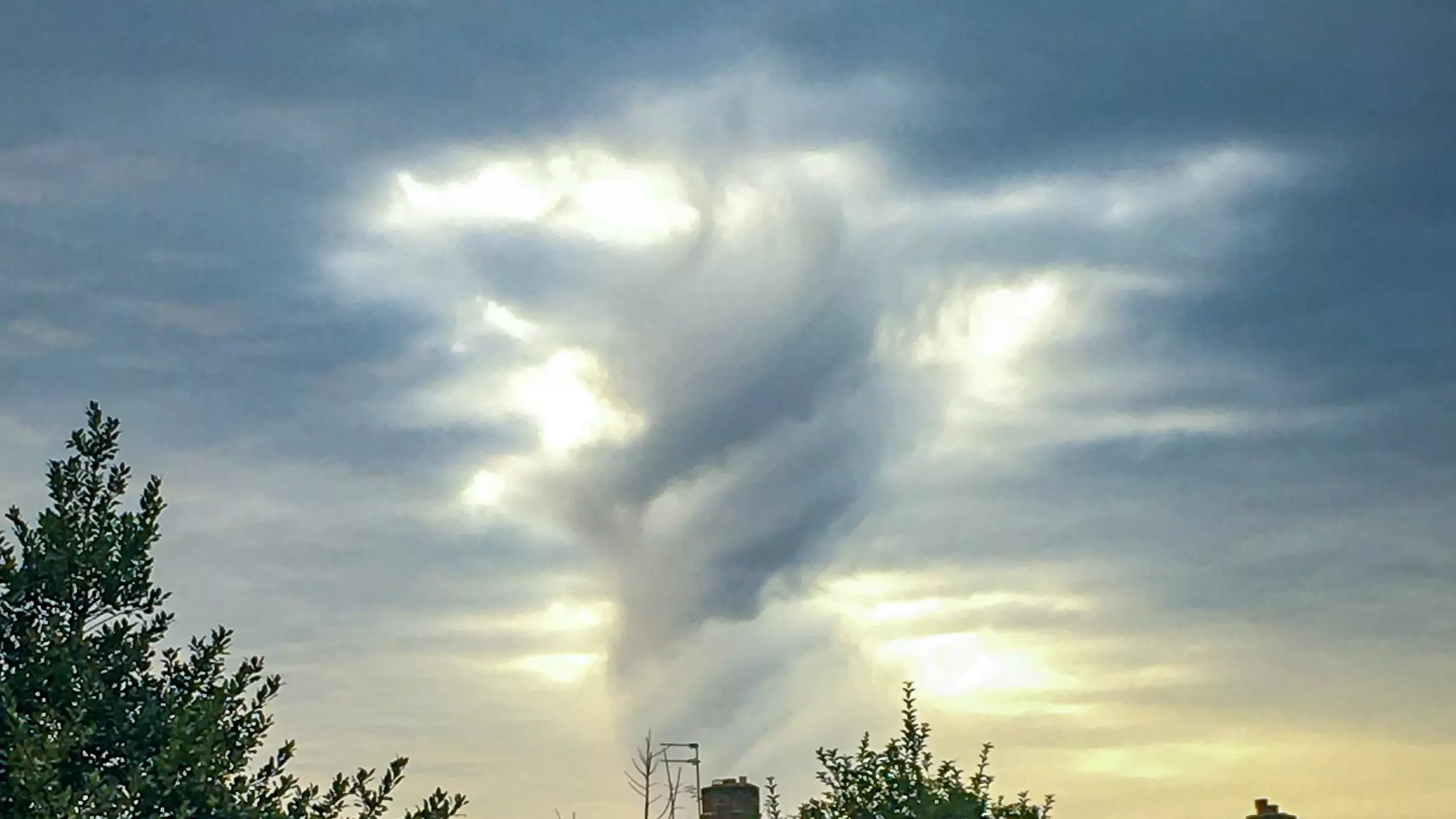 Woman Shares Photo Of Cloud That Looks Like 'Jesus With His Arms Outstretched' 