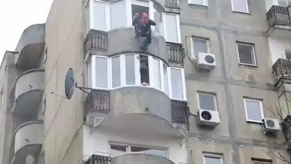 Firefighter Abseils Down Building To Save Woman Threatening To Jump