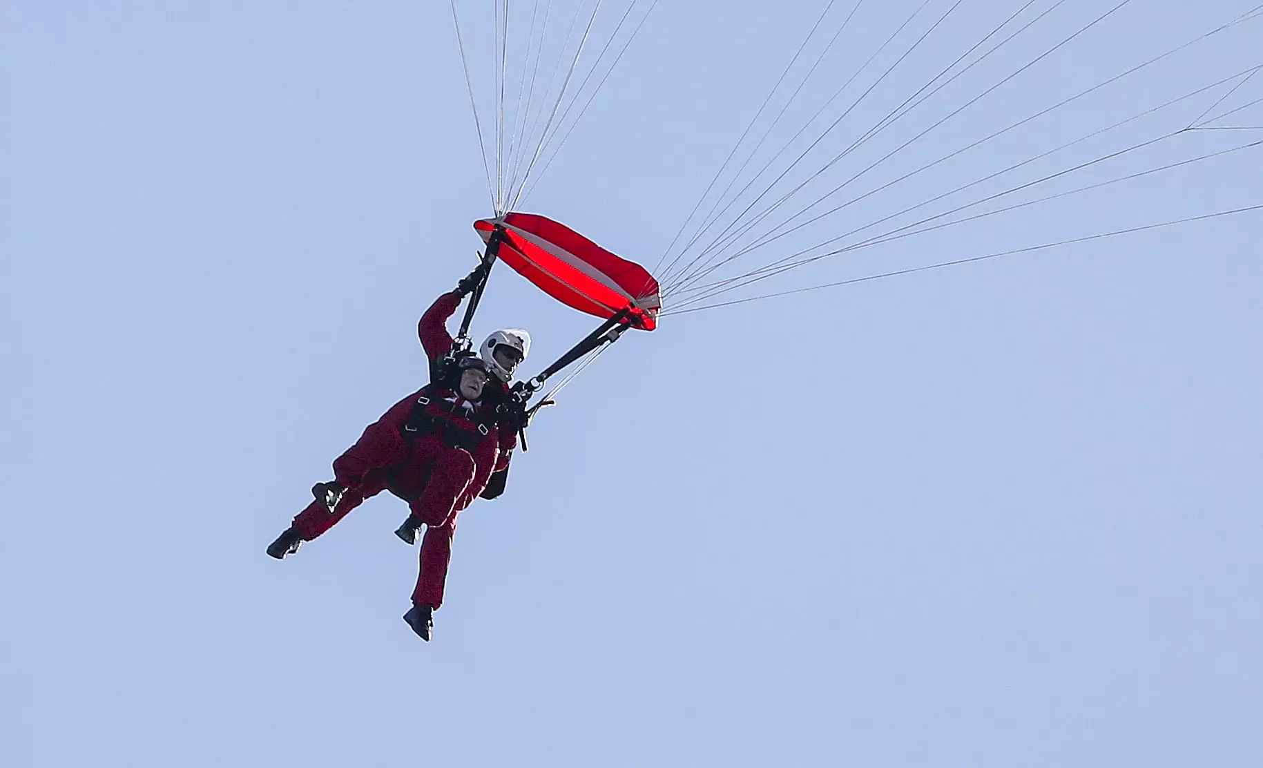 Sandy jumped with a parachutist from the Army's Red Devils.
