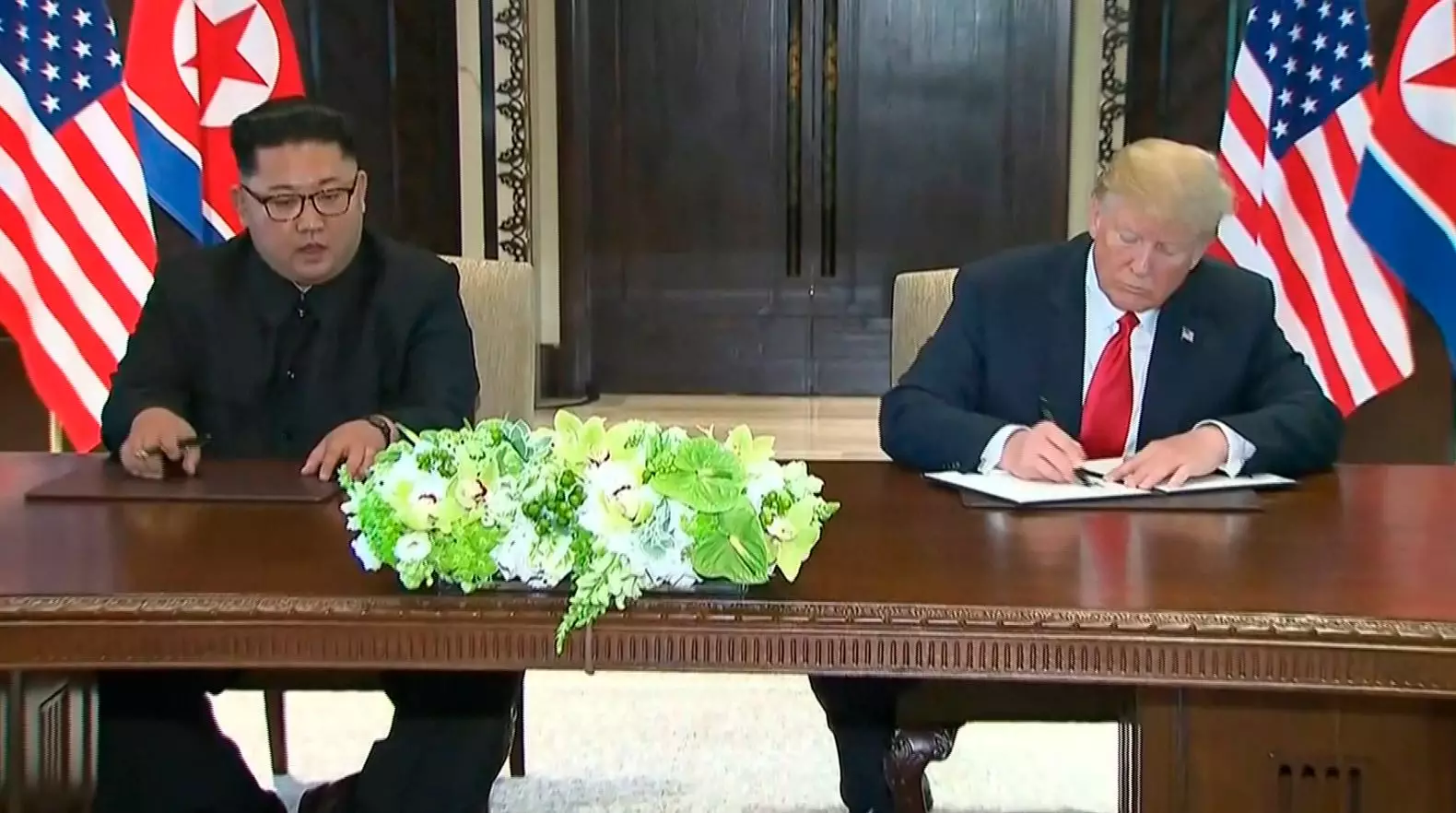 ​North Korean Denuclearisation Process To Start 'Very Quickly' As Donald Trump And Kim Jong Un Sign Document