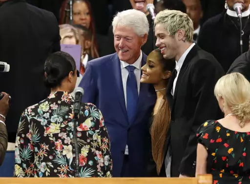 Clinton posing for a picture with Ariana and her fiance, Pete Davidson.