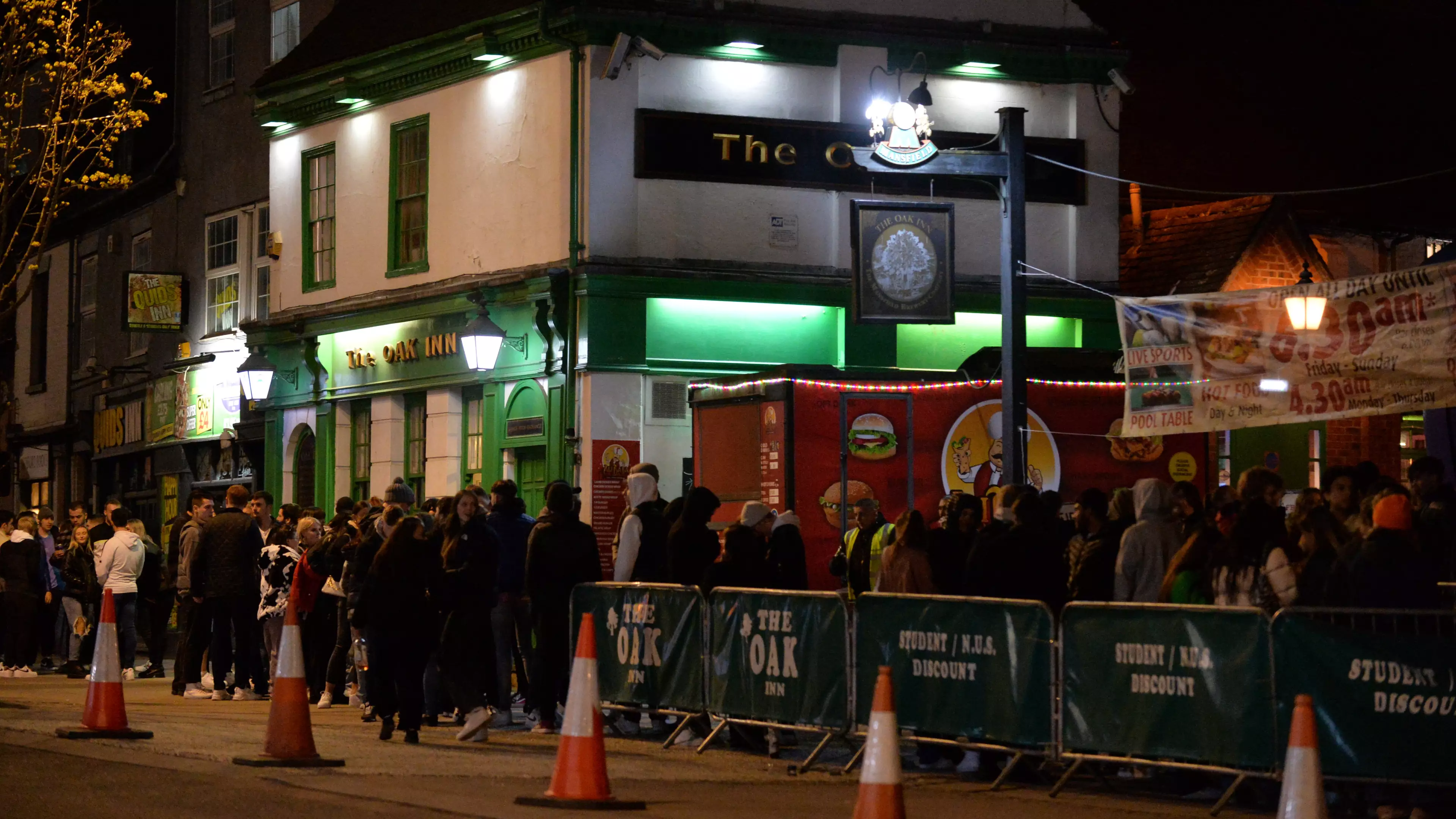 Pub Goers Queue Up At Midnight To Have First Pints As Lockdown Eases