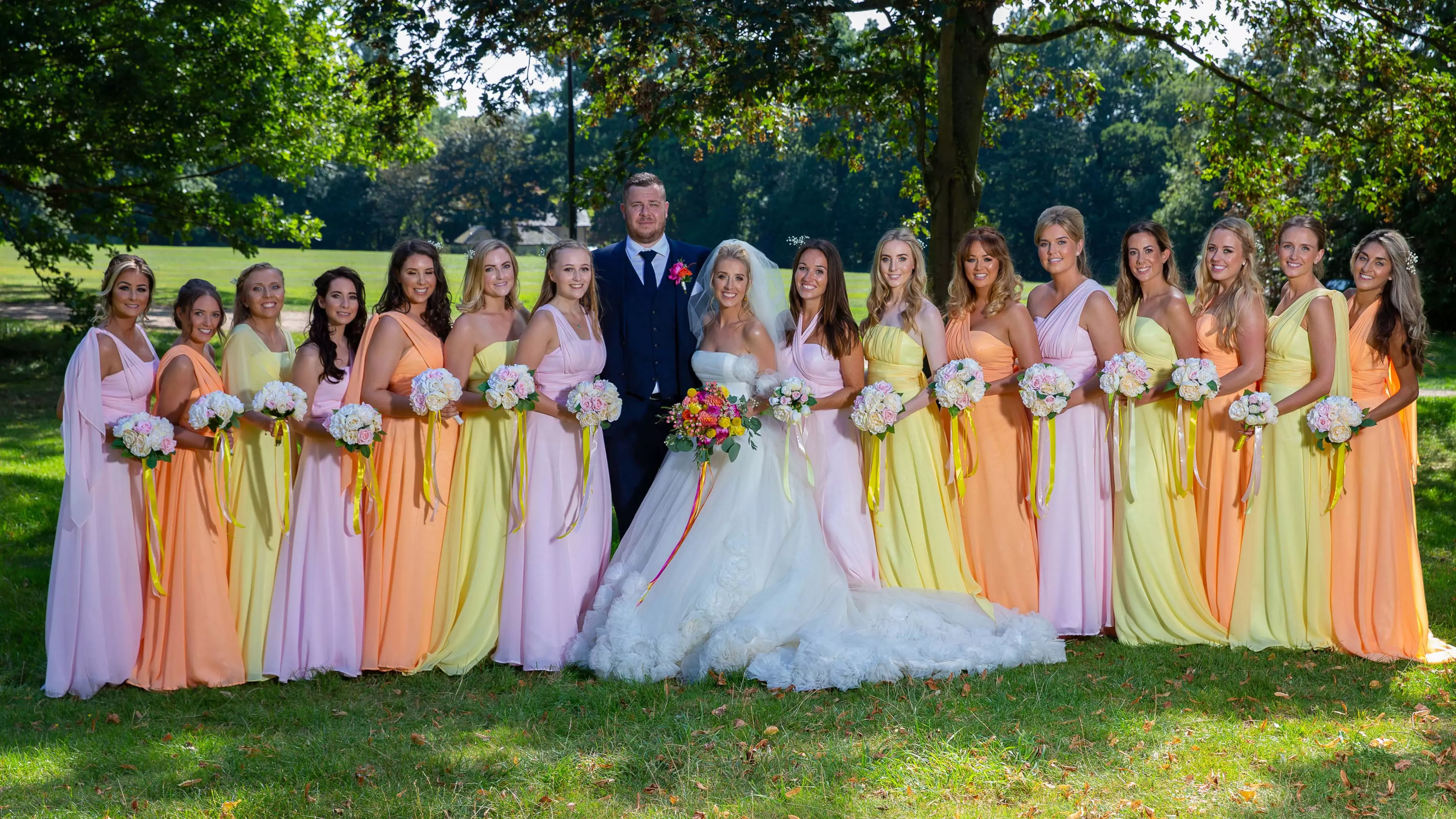 Extra AF Bride Walks Up The Aisle With No Less Than Fifteen Bridesmaids