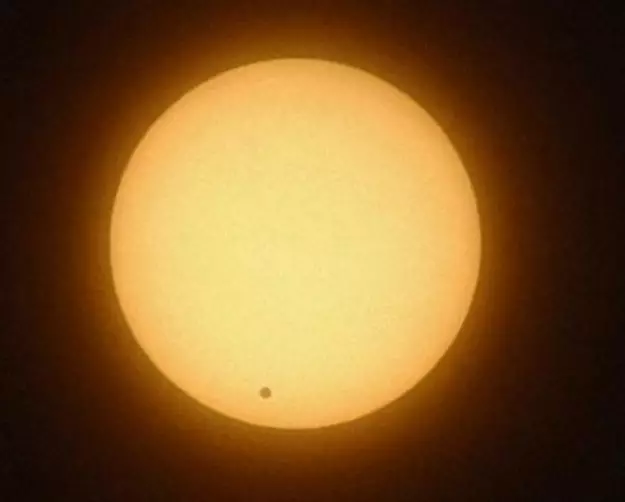 Venus moving in front of the Sun.