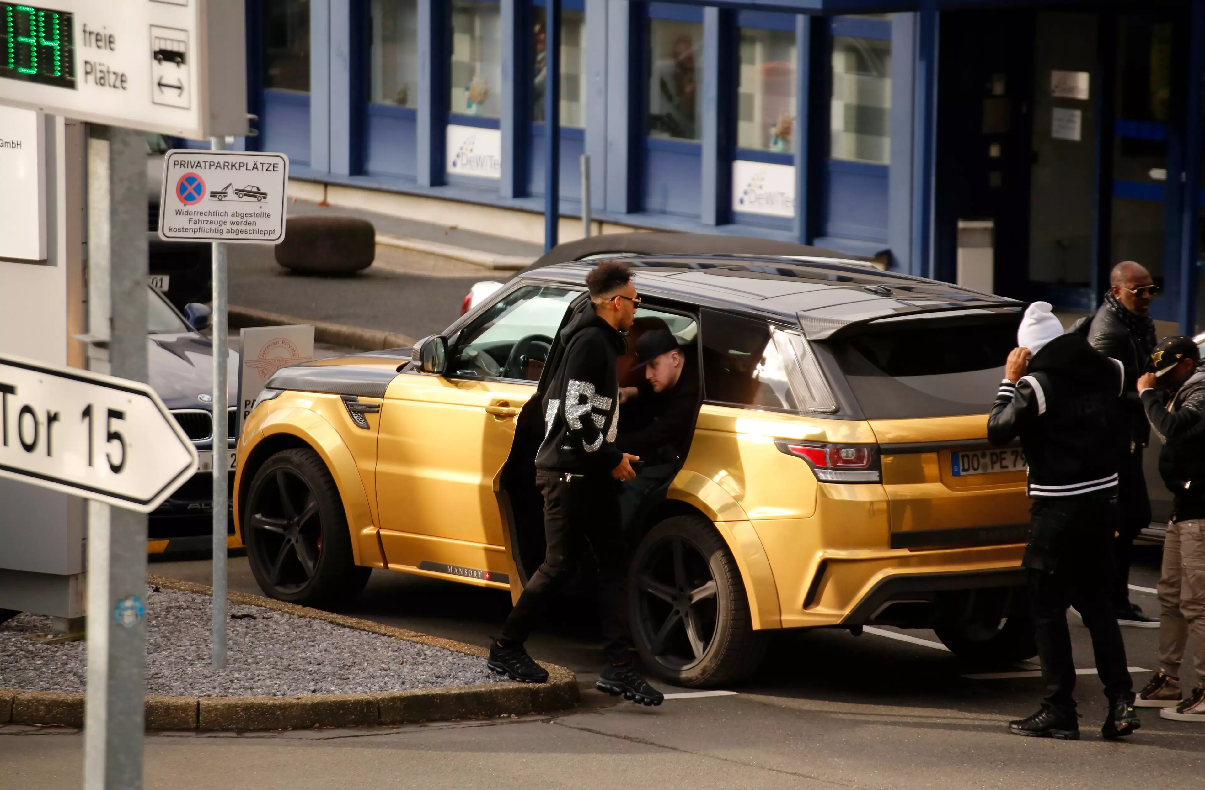 Not wanting to be spotted Aubameyang arrives at Dortmund airport in a gold Range Rover. Image: PA Images.