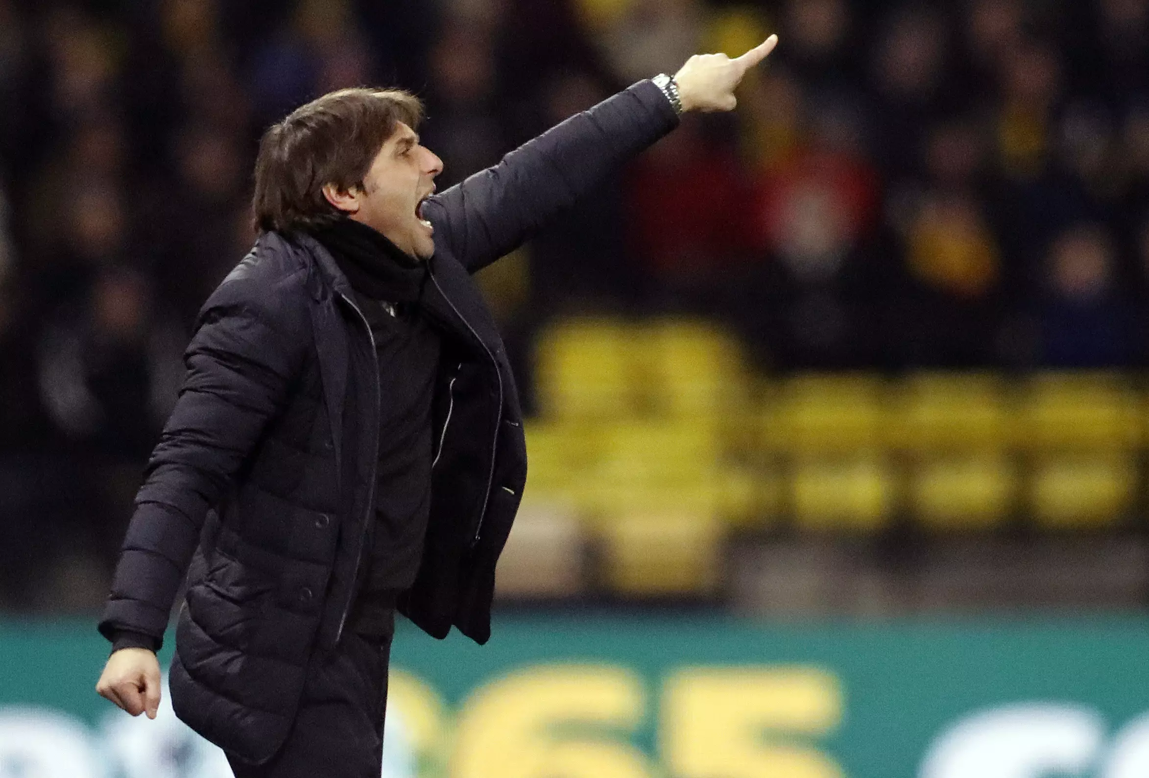 Conte barks out orders from the touchline. Image: PA