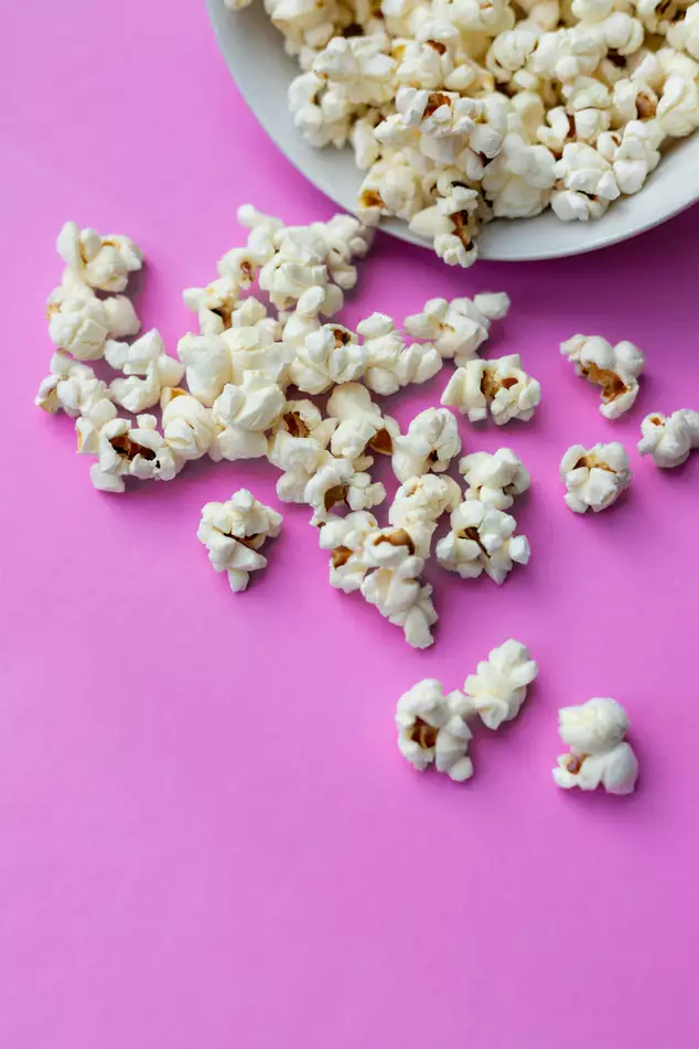 Snuggle up under a blanket with a box of buttery popcorn for an evening of movie magic (