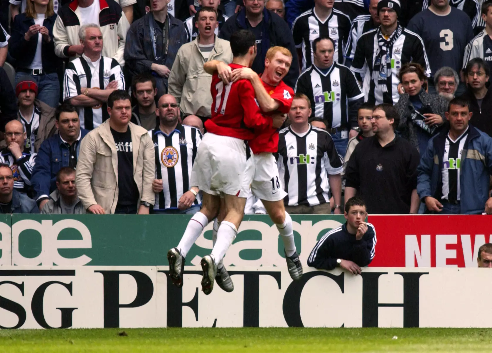 Scholes and Giggs celebrate scoring a goal. Image: PA