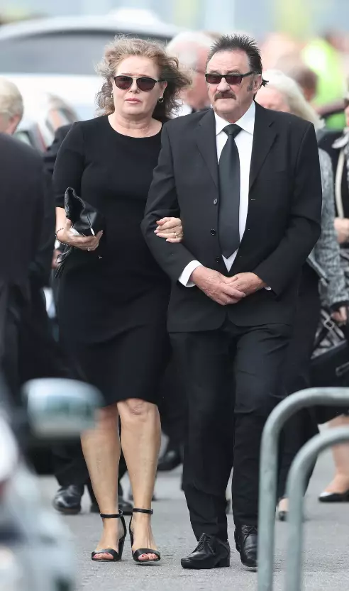 Paul arriving at Barry's funeral.