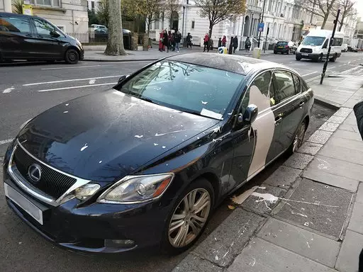 The car was covered in white paint.