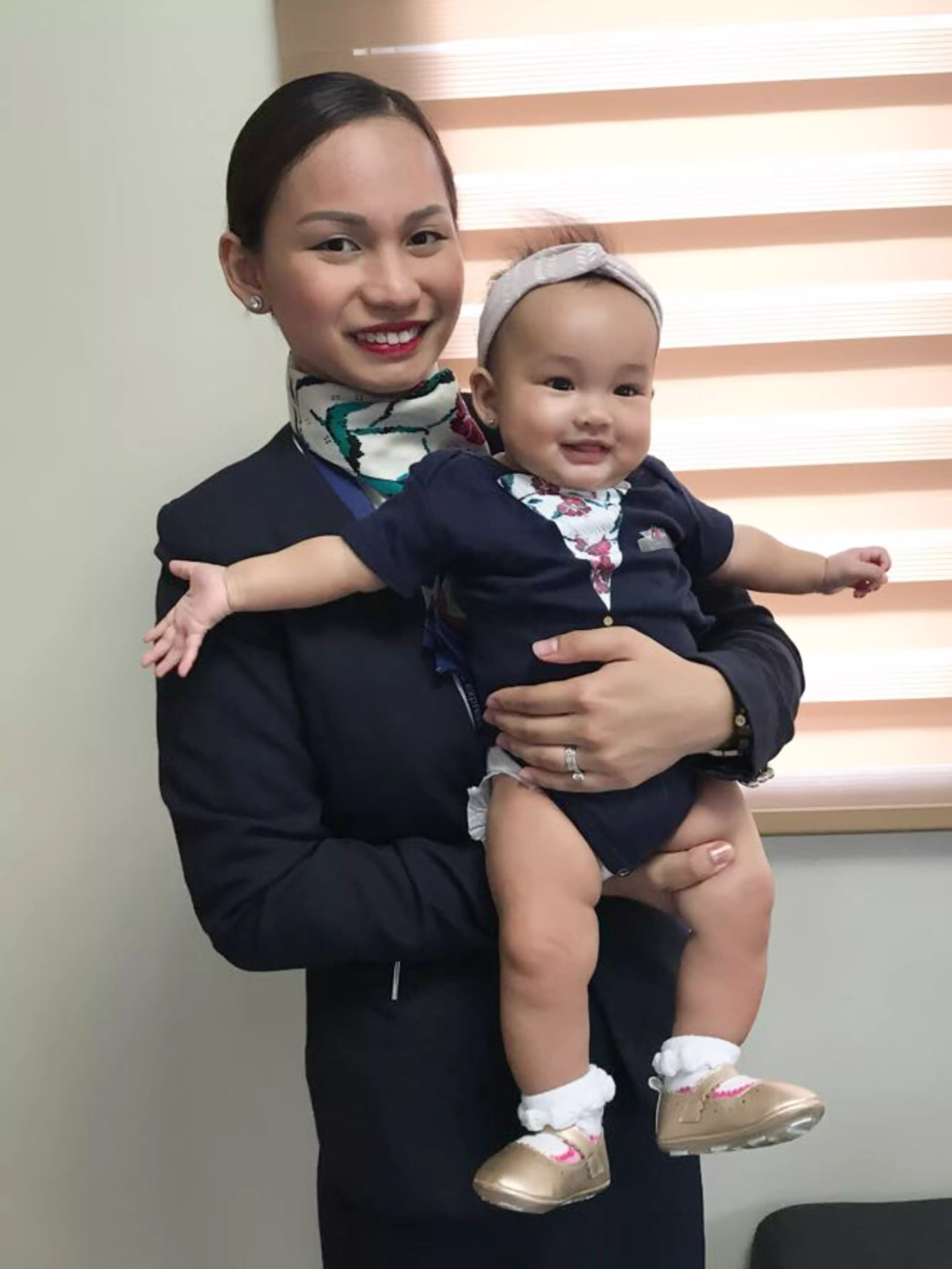 Flight attendant Patrisha Organo with her daughter Jade.