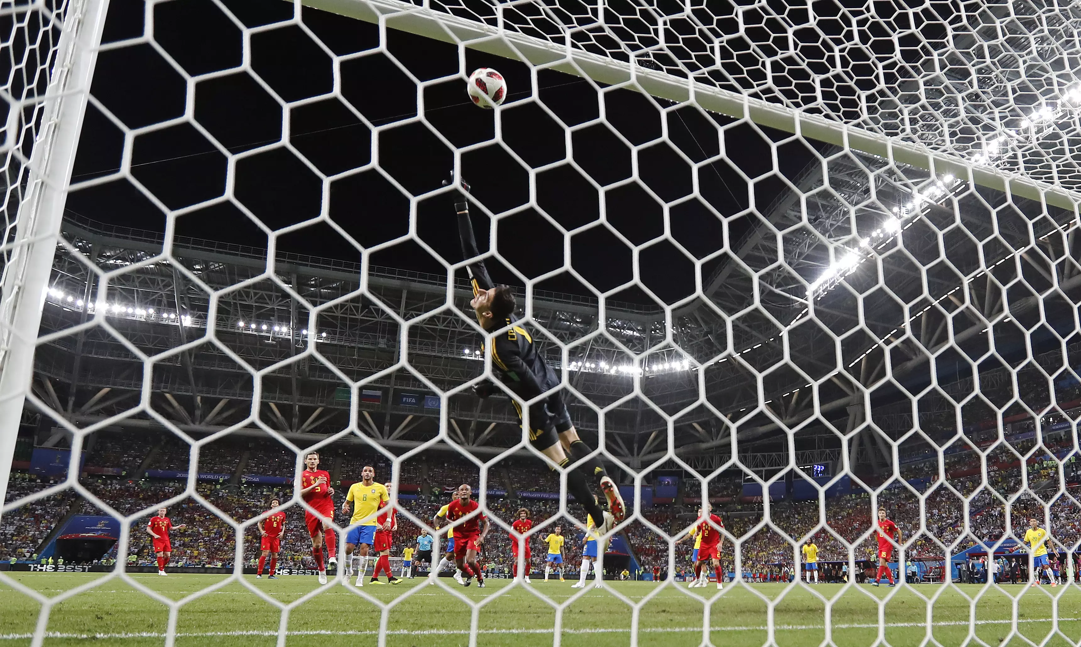 Courtois with a brilliant save. Image: PA