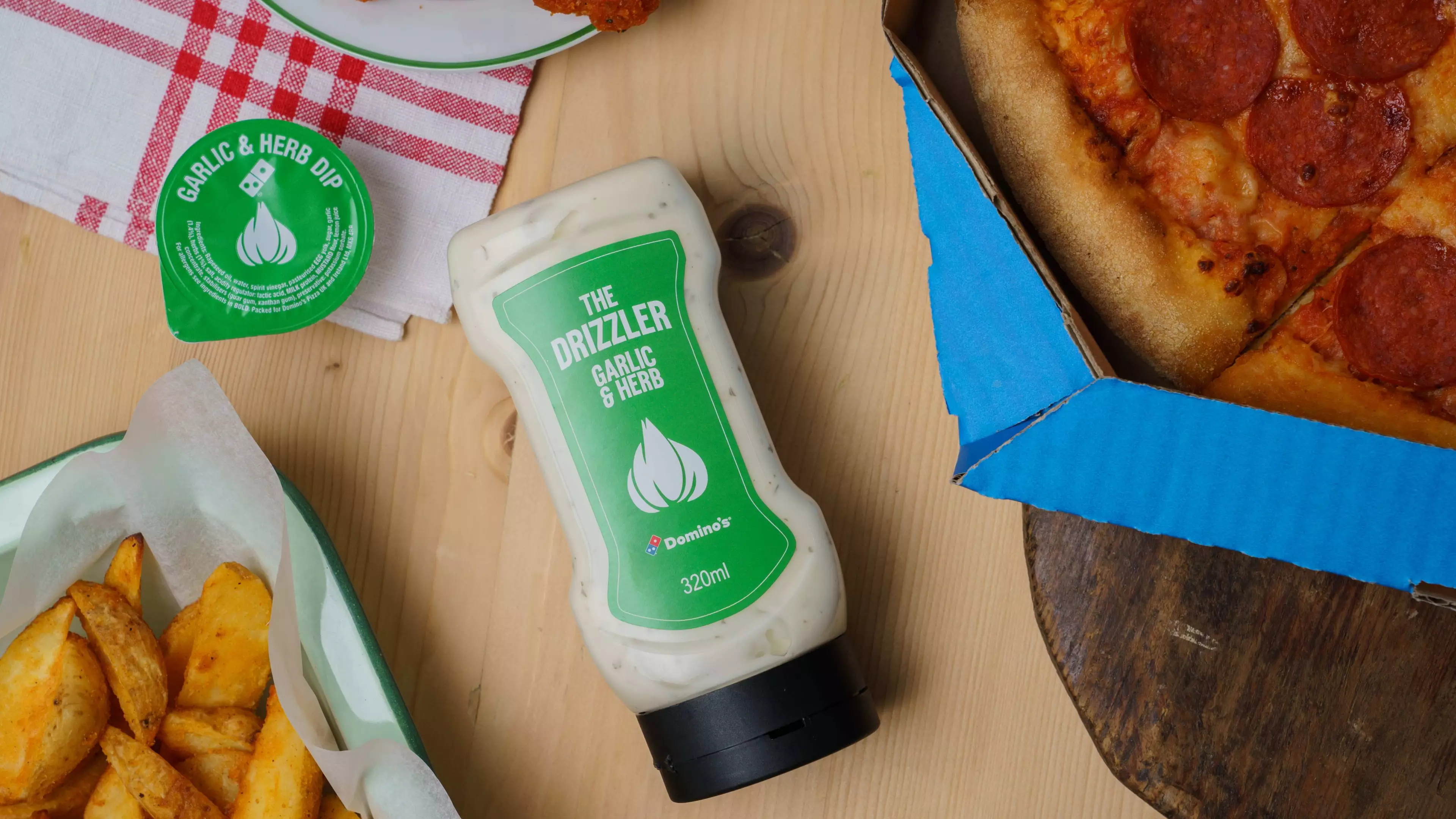 Domino's Has Launched Garlic & Herb Sauce Bottles For The First Time