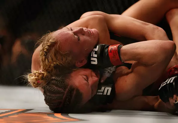 Miesha Tate Sets Up Huge Rematch With Ronda Rousey After Destroying Champion Holly Holm At UFC 196