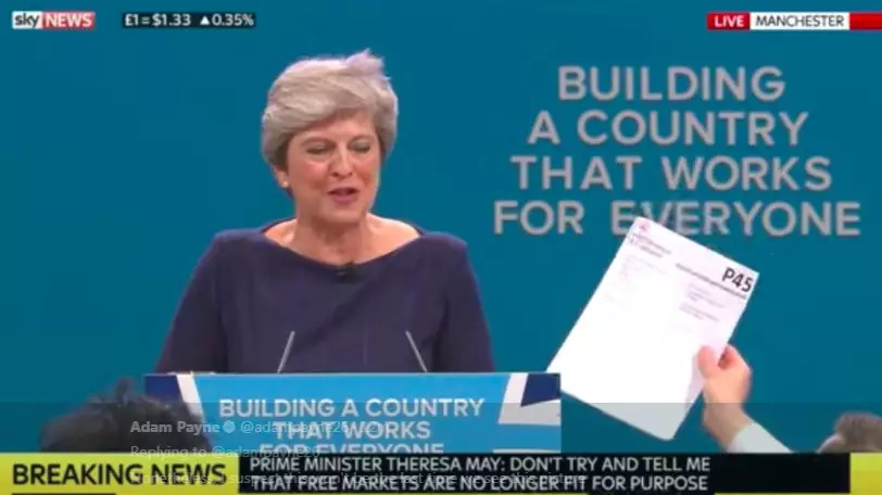 Guy Kicked Out Of Tory Conference After Handing Theresa May P45