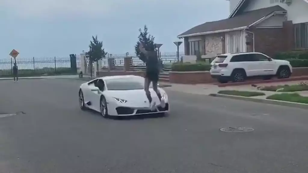 Man Attempts Jump Over Lamborghini And Fails Miserably