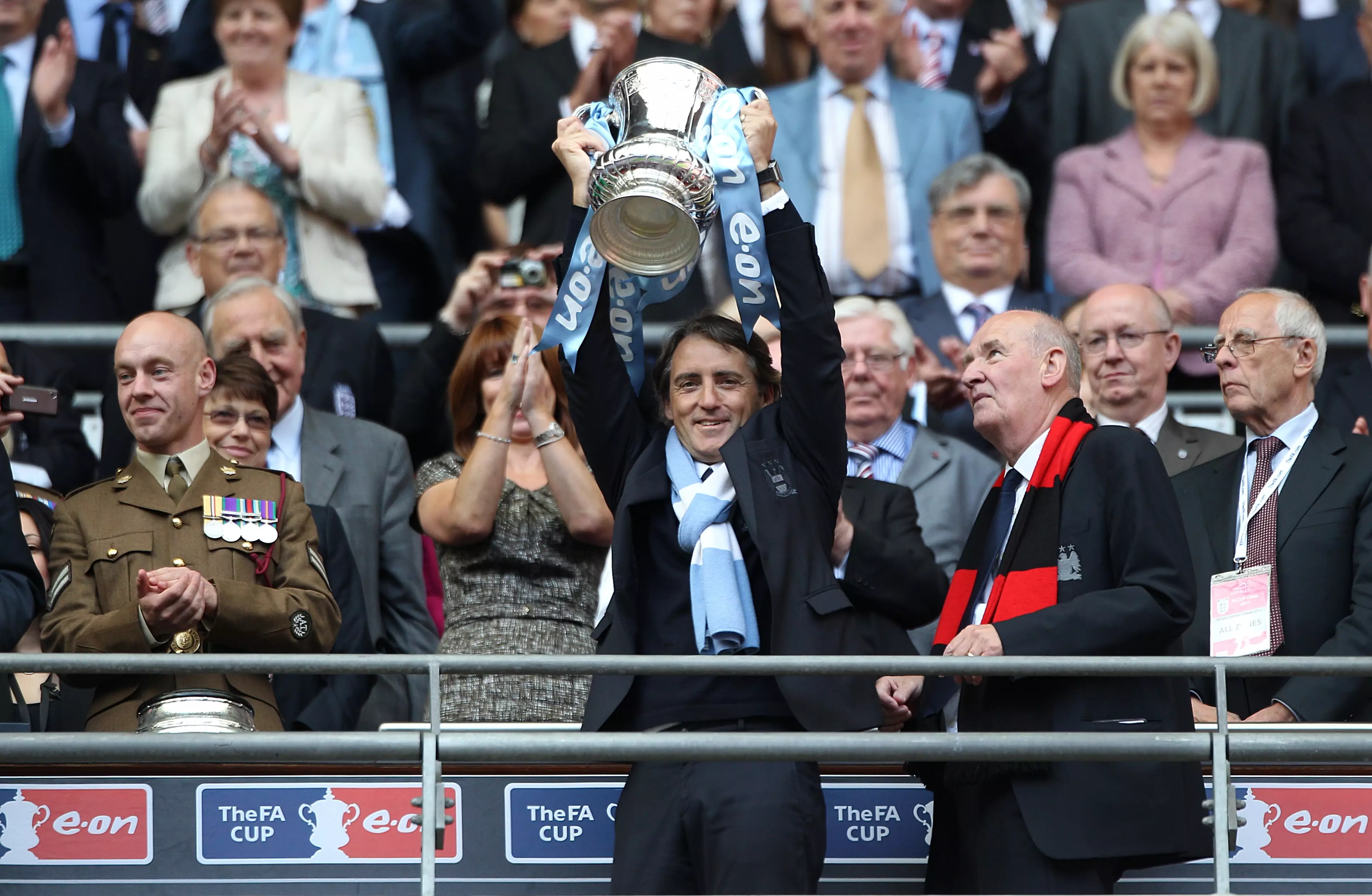 Mancini holds aloft the FA Cup. Image: PA