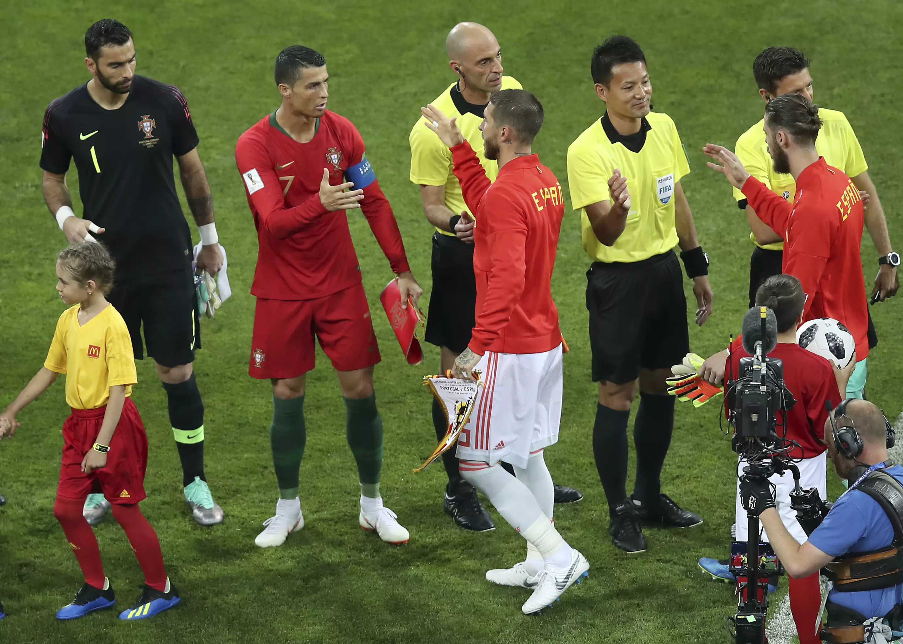 Ronaldo and Ramos shake hands before going to battle. Image: PA