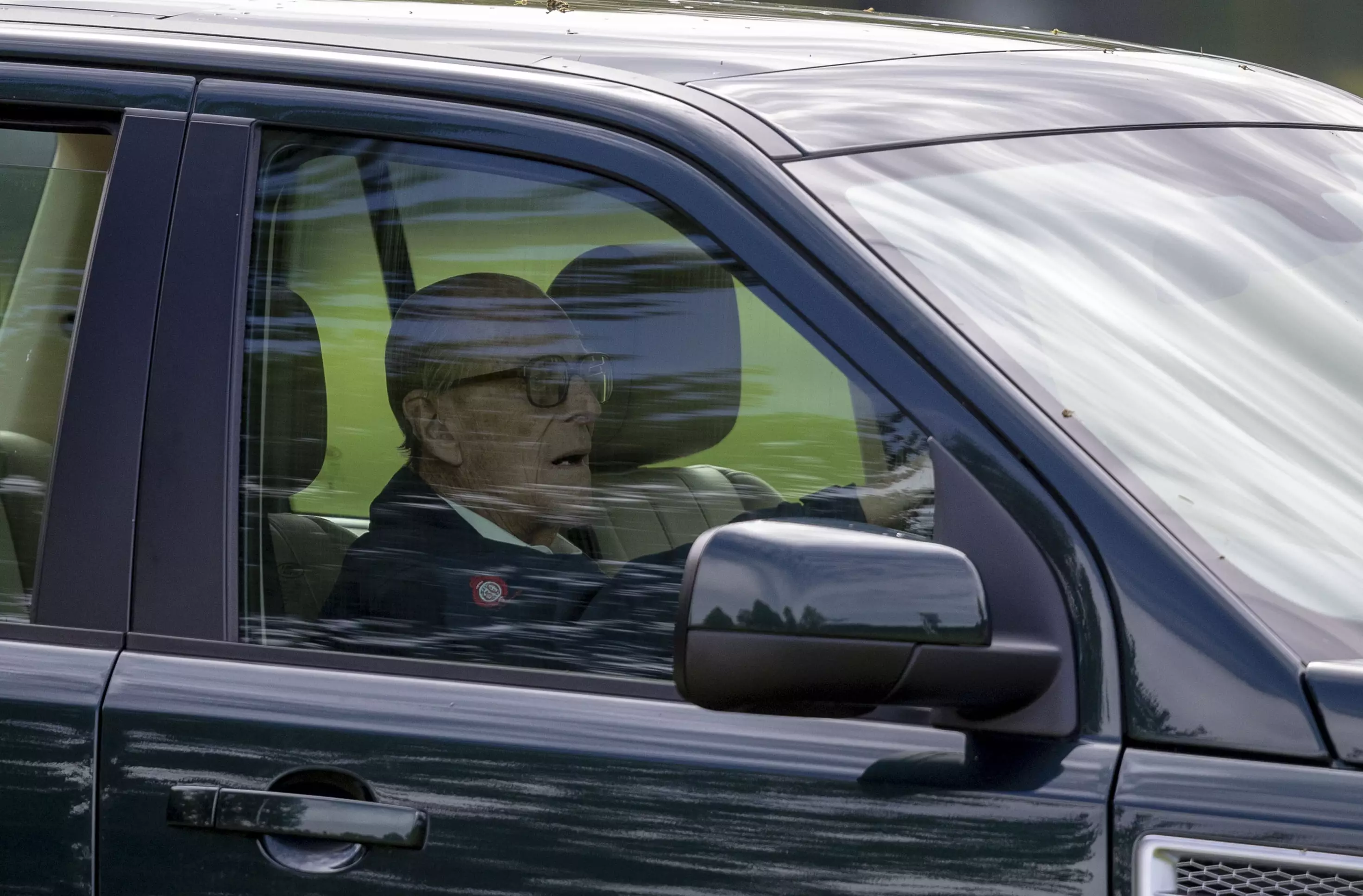 Prince Philip is his car.