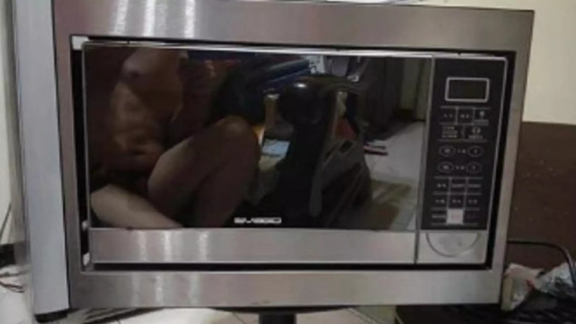 Man Accidentally Gives Full Frontal Flash While Advertising Microwave On Facebook