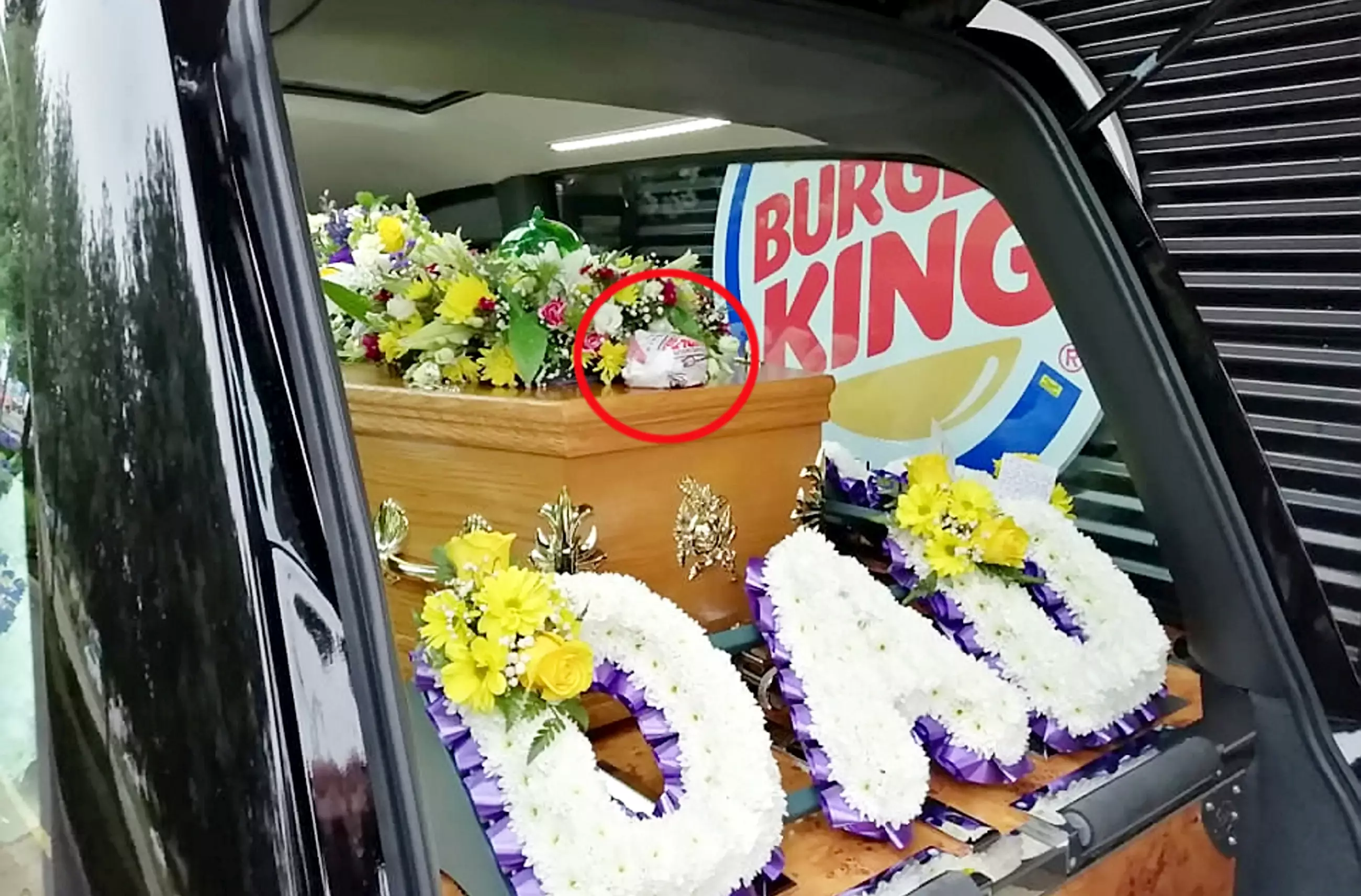 The Bacon Double Cheeseburger was placed lovingly on the coffin.