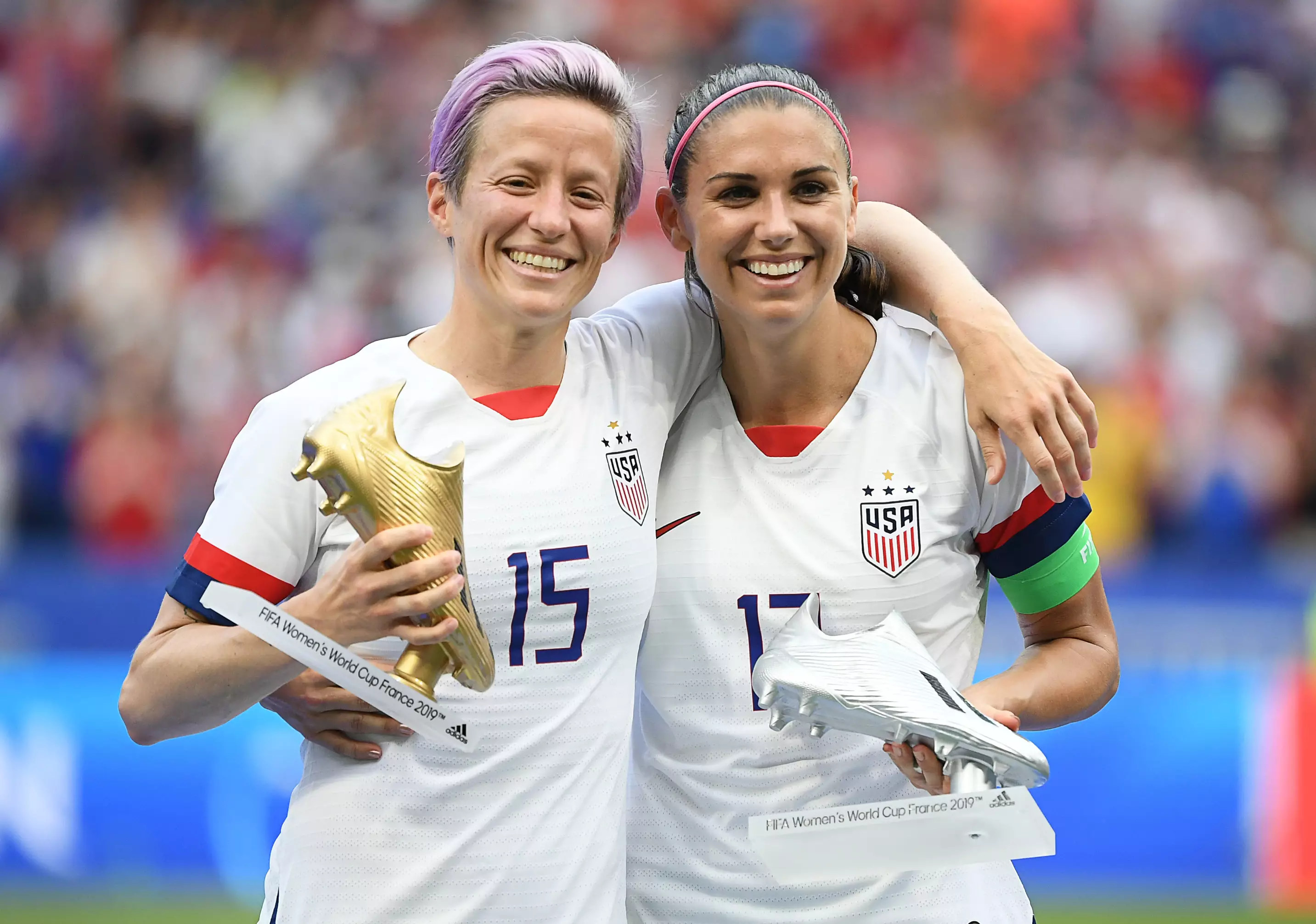 Rapinoe celebrates with her Golden Boot. Image: PA Images