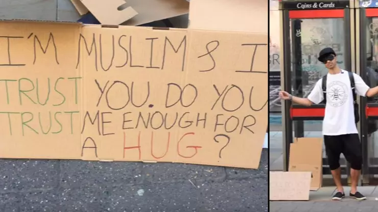 Blindfolded Muslim LAD Stands In Manchester Offering Hugs To Passers By 
