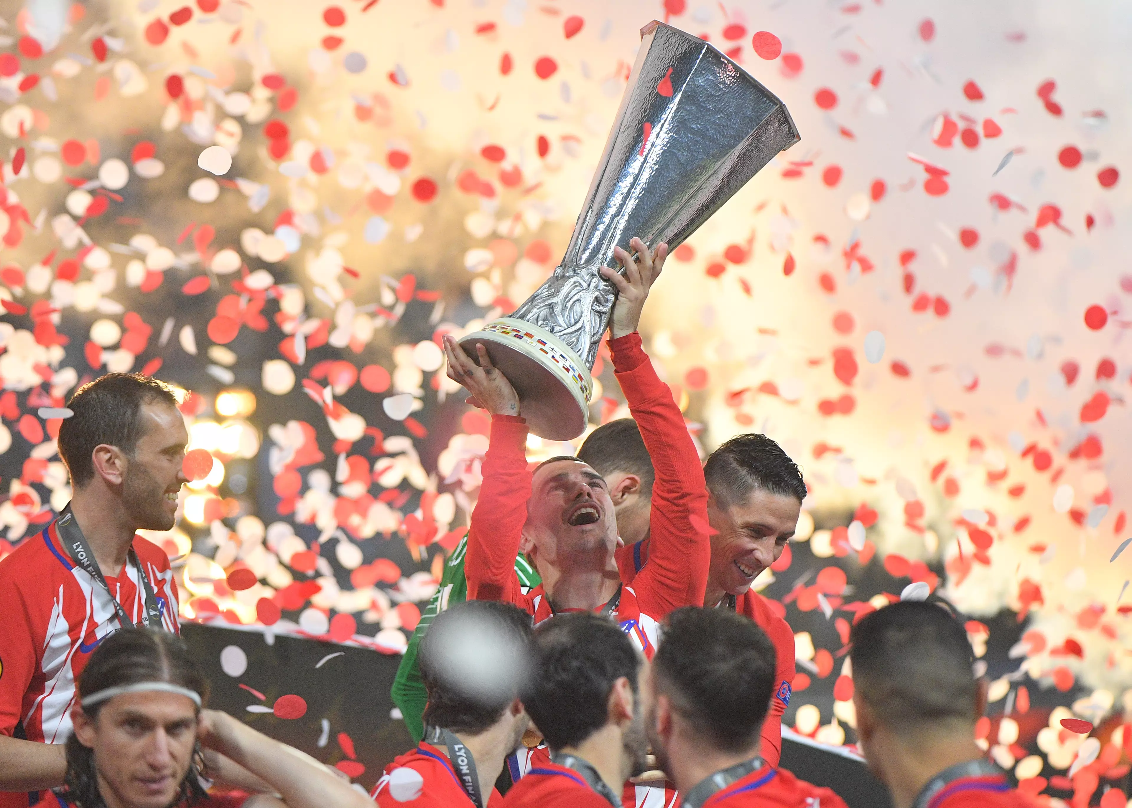 Griezmann holds aloft the Europa League trophy. Image: PA