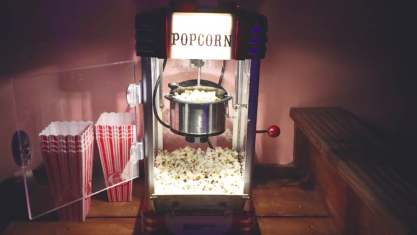 The space includes a home cinema and pop corn machine (