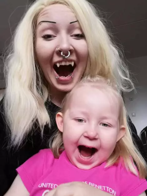 Julia says her four-year-old daughter loves her fangs.