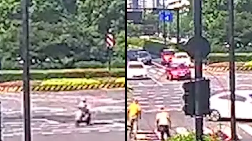 Woman Knocked Off Her Scooter Before Falling Straight Down A Manhole